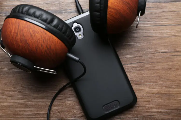 black-smartphone-wooden-headphones-top-view.jpg