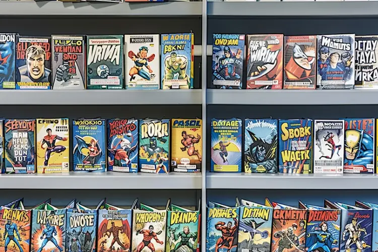 comic-book-fans-office-shelf-with-graphic-novels-comics (1).jpg