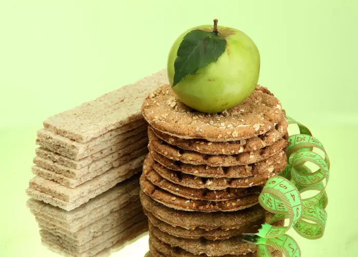 healthy-snacks-with-apple-crackers-and-tape-measure.jpg