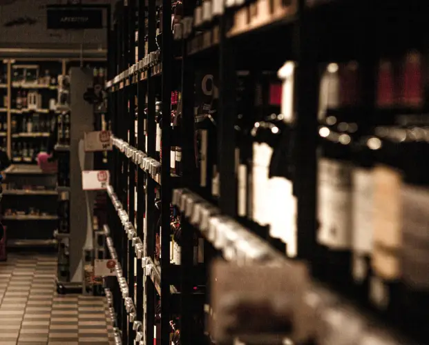 dimly-lit-liquor-store-aisle.jpg
