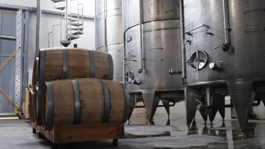 wooden-wine-barrels-and-fermentation-tanks.jpg