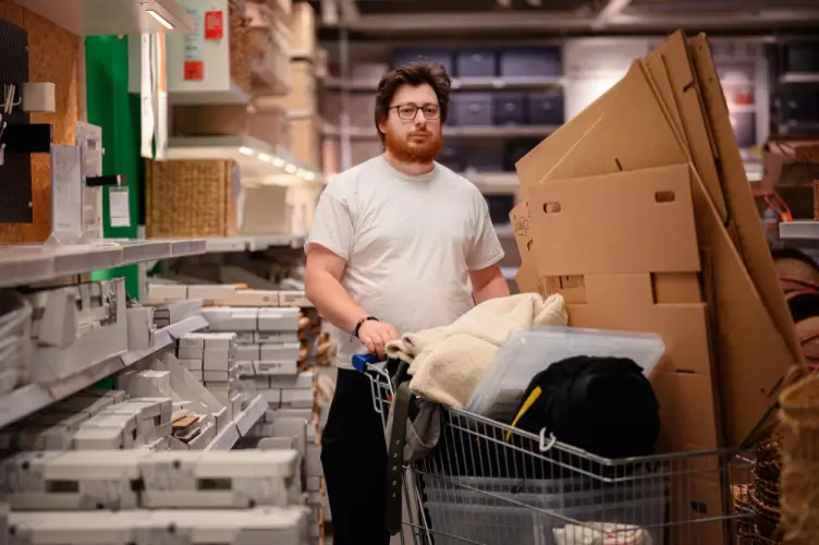 man-shopping-for-home-goods-with-cart.jpg