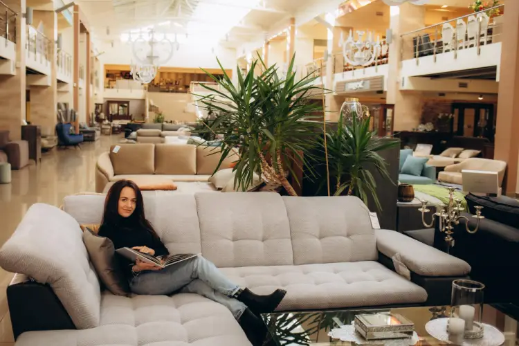 woman-reading-catalog-on-sectional-sofa.jpg