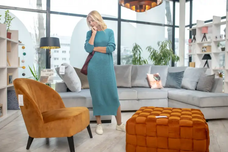 woman-shopping-in-stylish-living-room-furniture-store.jpg