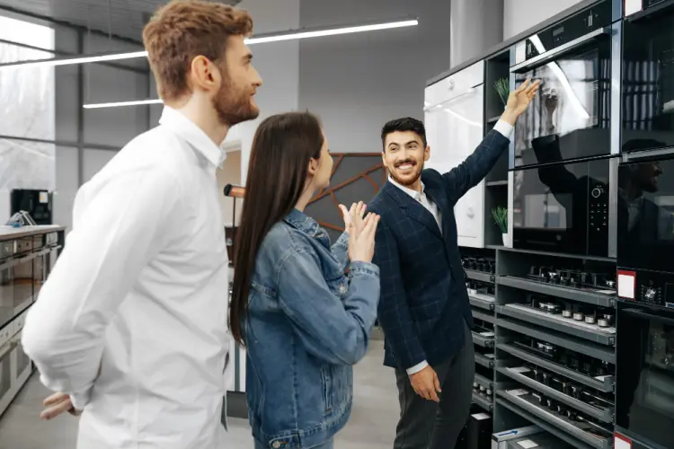 sales-consultant-helping-customers-choose-kitchen-appliances.jpg