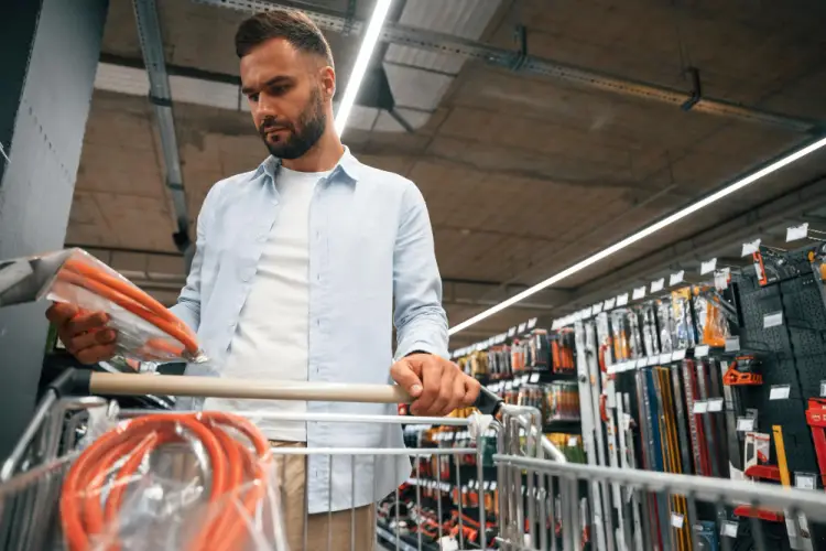 man-shopping-cables-hardware-store.jpg