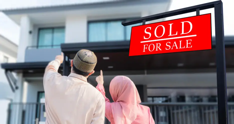 happy-couple-new-home-sold-sign.jpg