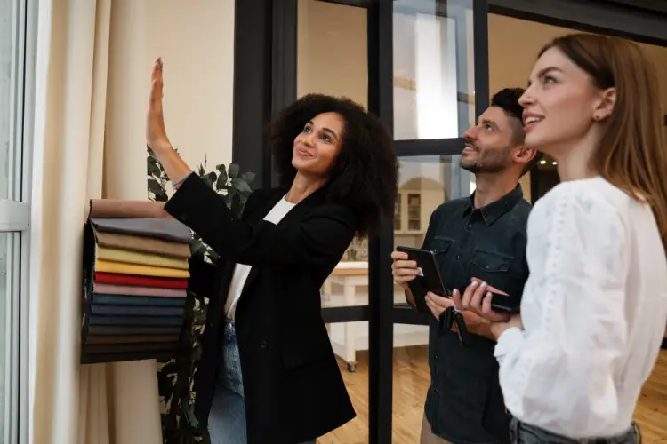 interior-designer-showing-fabric-options-to-clients.jpg