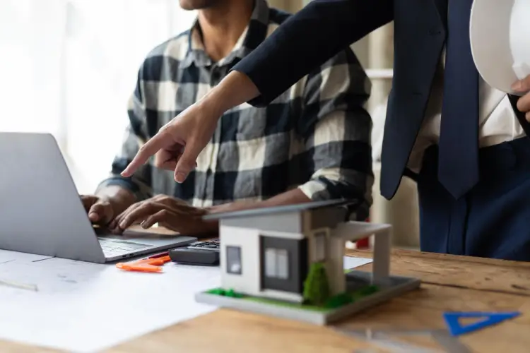 architect-and-realtor-discussing-home-project.jpg