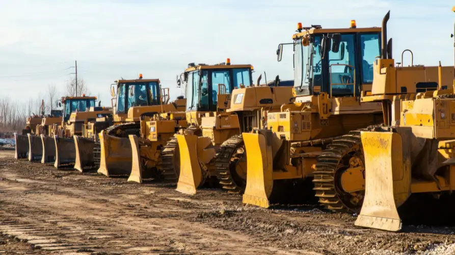 bulldozers-ready-on-muddy-construction-ground.jpg
