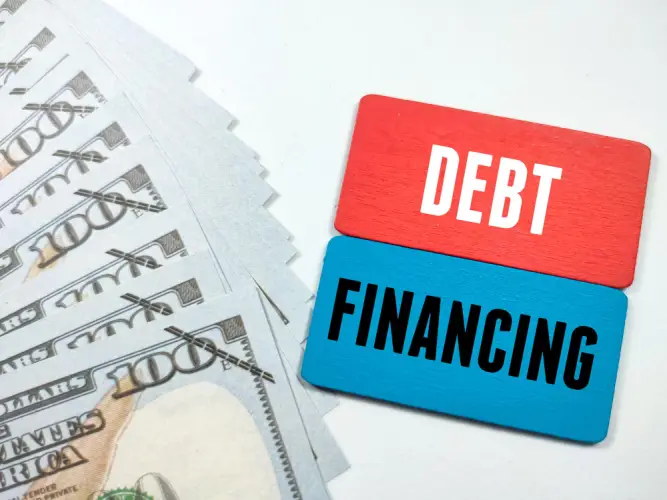 debt-financing-on-money-background.jpg