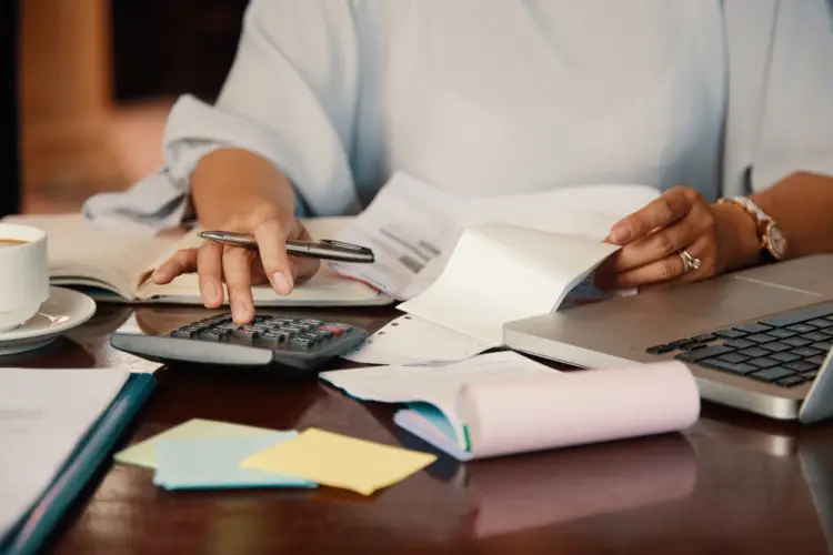 woman-calculating-expenses-for-tax-filing.jpg
