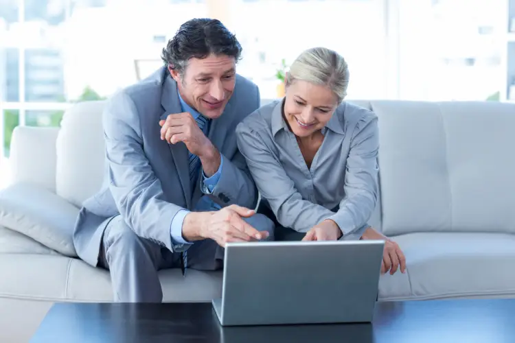 business-couple-reviewing-online-portfolio.jpg