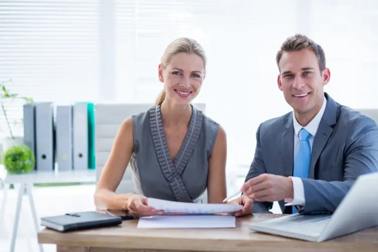 business-meeting-two-professionals-smiling.jpg