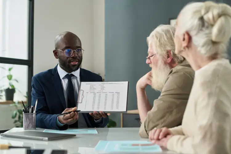 advisor-presenting-retirement-options-couple.jpg