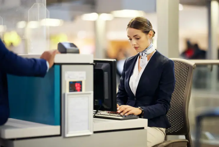 airport-checkin-agent-working.jpg