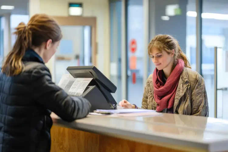 customer-filling-form-service-desk.jpg