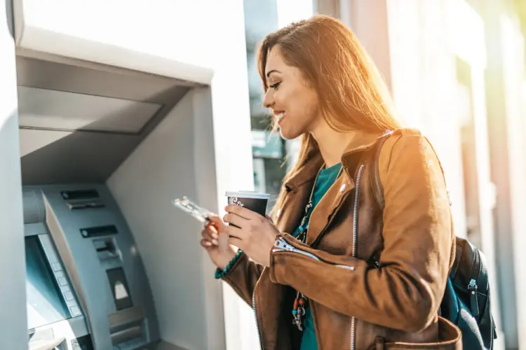 woman-using-atm-machine-card.jpg