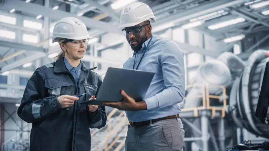 manufacturing-engineers-reviewing-plans-plant.jpg