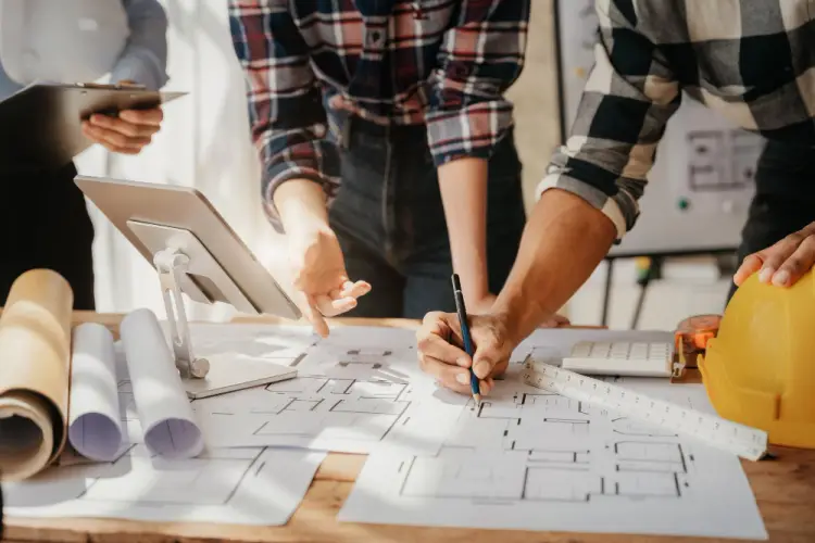 construction-plans-team-collaboration-hard-hat-tablet.jpg