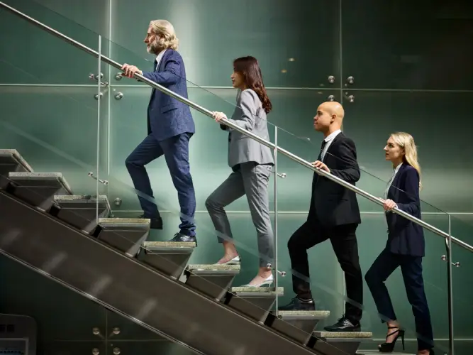 business-professionals-climbing-glass-staircase.jpg