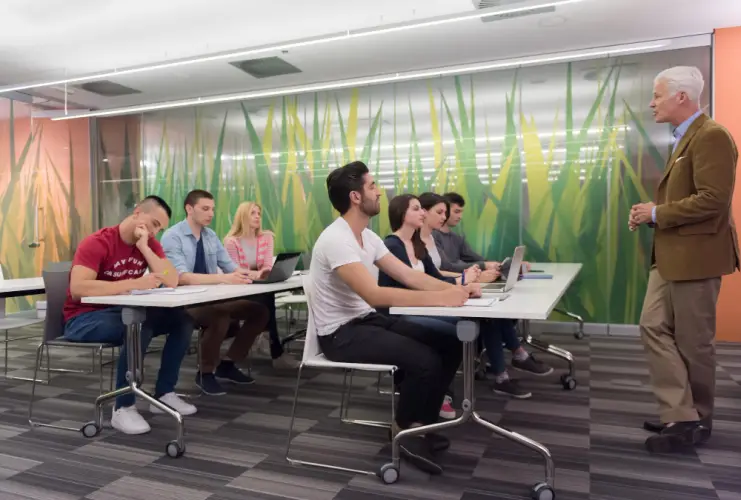university-classroom-instructor-teaching-students.jpg