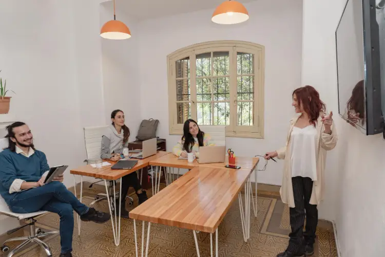office-training-session-small-group-presentation.jpg