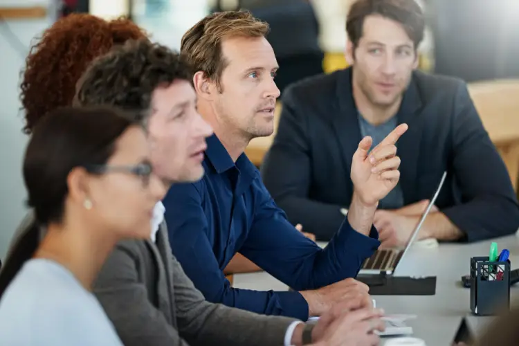 business-meeting-participants-discussing-strategy.jpg