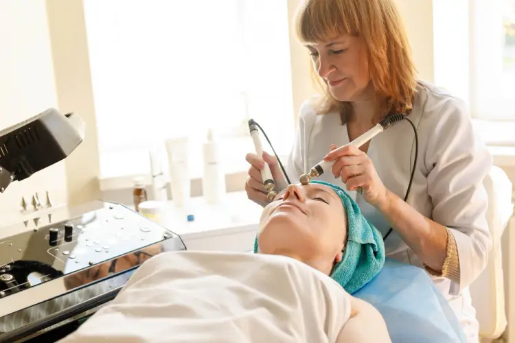 professional-aesthetician-performing-facial.jpg