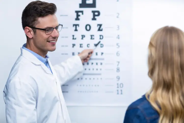 eye-doctor-pointing-at-eye-chart.jpg