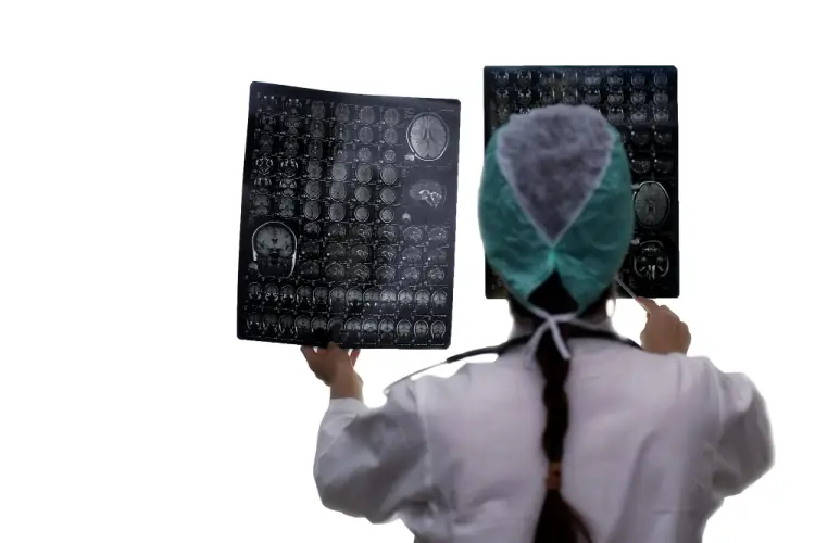 radiologist-reviewing-brain-mri-on-white-background.jpg