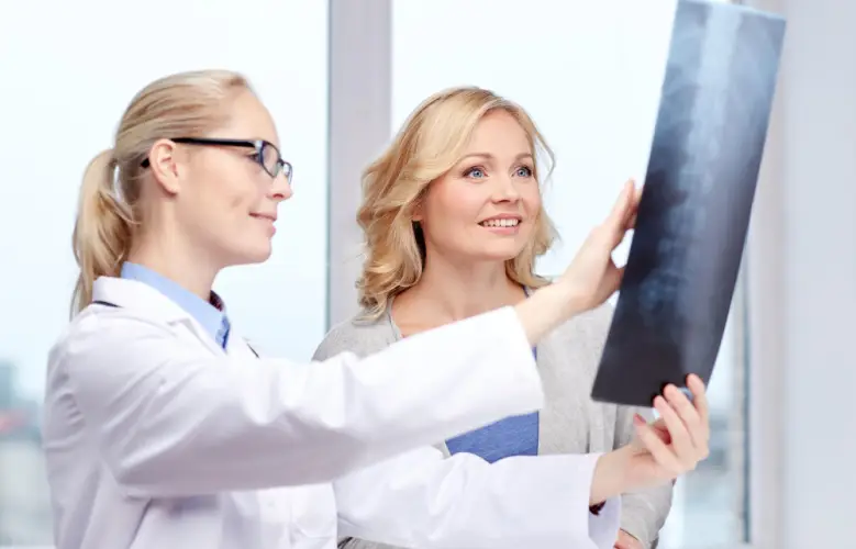female-doctor-showing-xray-to-patient.jpg