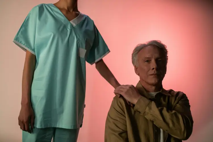 nurse-supporting-senior-in-assisted-living.jpg