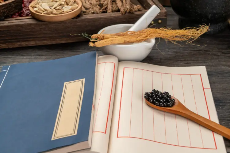 chinese-medicine-book-and-herbs.jpg