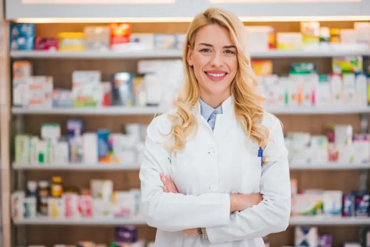female-pharmacist-standing-in-pharmacy.jpg
