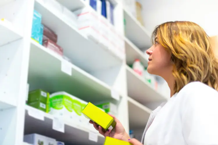pharmacist-organizing-medicine-shelves.jpg