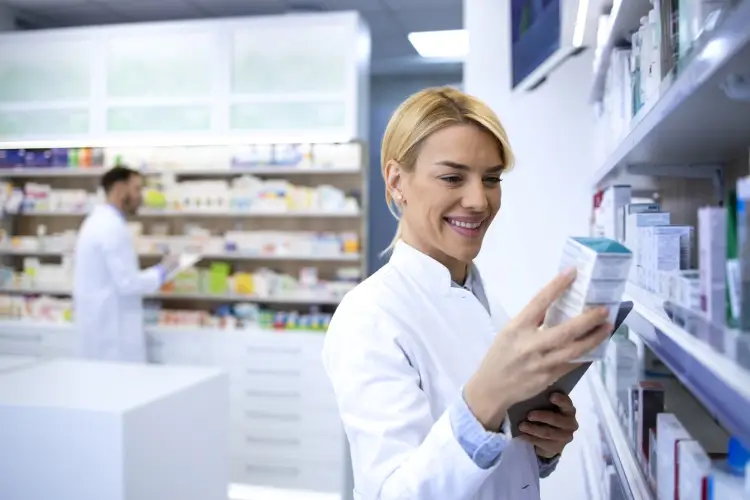 woman-pharmacist-holding-medicine-pharmacy-shop.jpg
