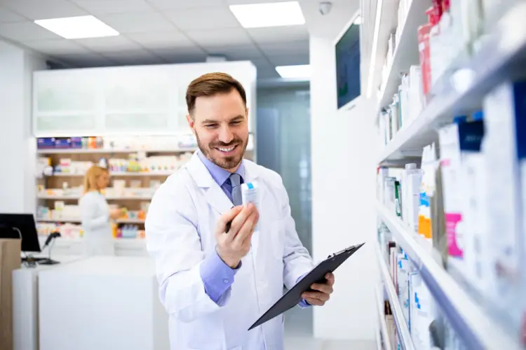 male-pharmacist-checking-medication.jpg