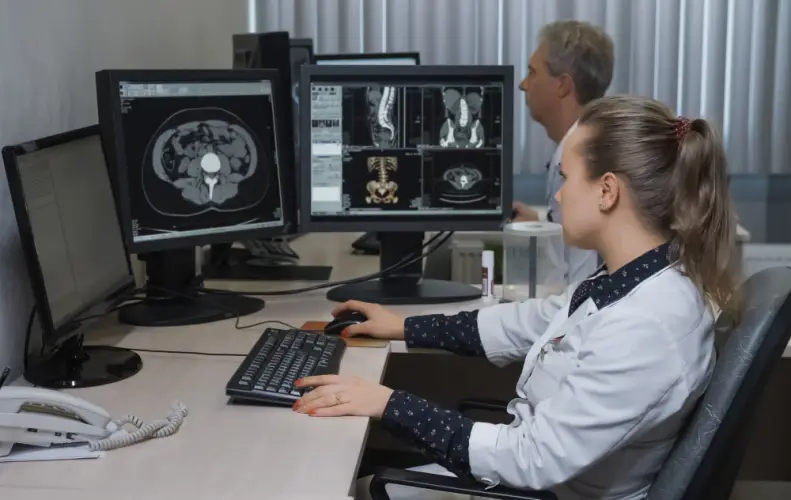 radiologists-analyzing-ct-mri-scans-on-monitors.jpg