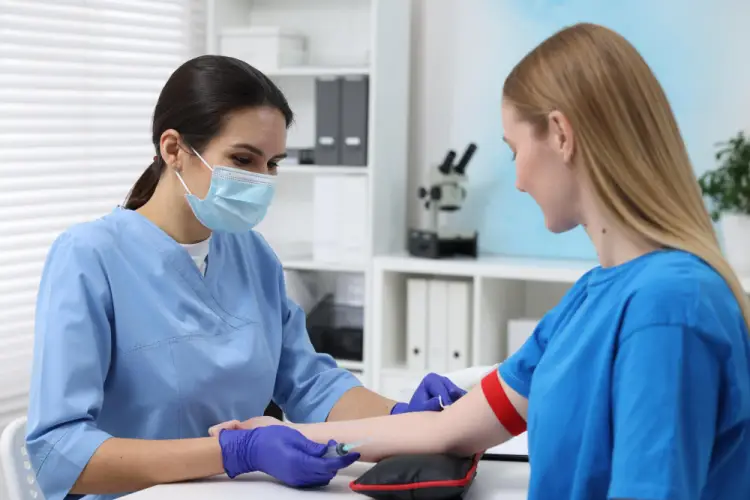 nurse-drawing-blood-young-patient.jpg