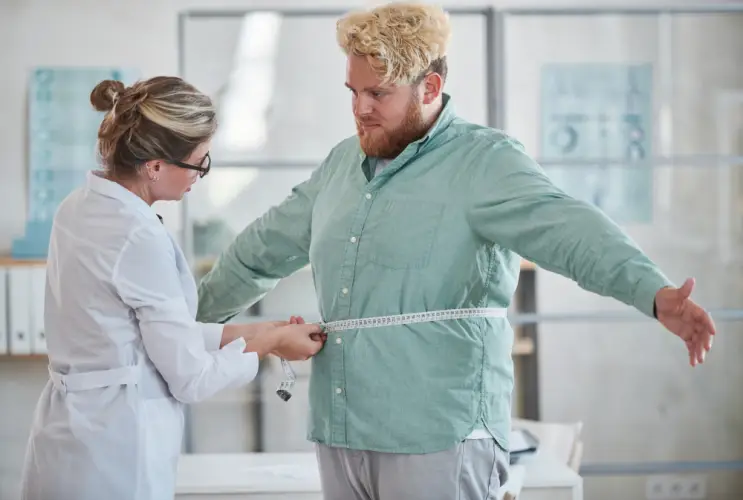 doctor-measuring-waist-obese-man.jpg