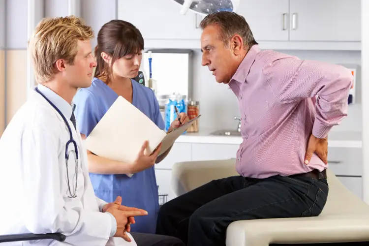 orthopedic-doctor-patient-consultation-back-pain.jpg