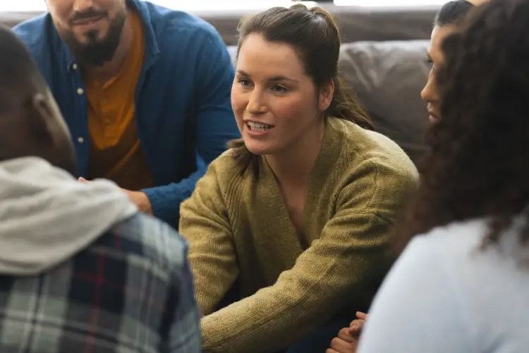 diverse-group-friends-talking-supporting-each-other-therapy-session.jpg
