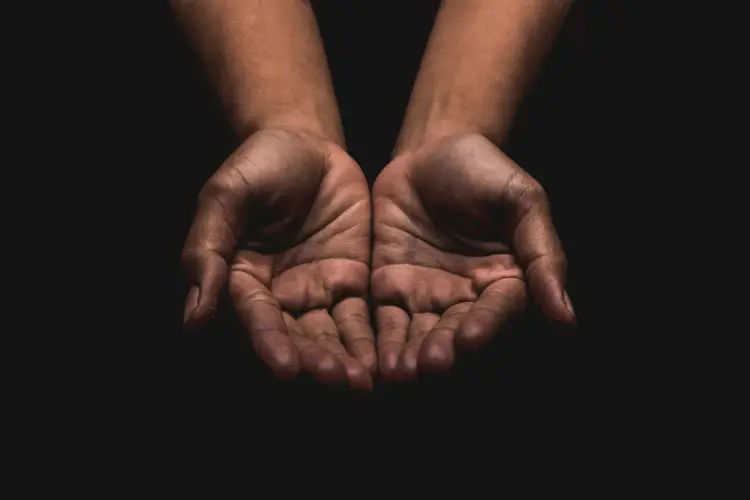 cupped-hands-dark-background.jpg