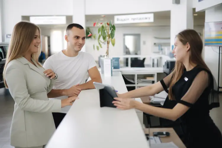customer-service-desk-discussing-documents.jpg