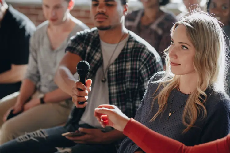 audience-member-taking-microphone.jpg