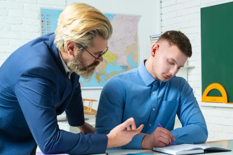 teacher-helping-student-in-classroom.jpg