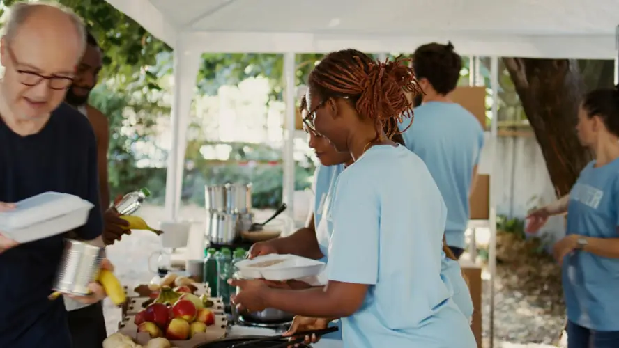 volunteers-serving-food-to-community.jpg