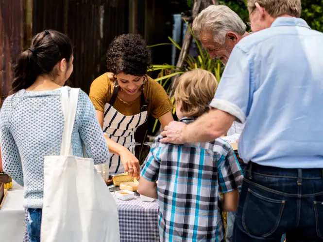 woman-serving-samples-at-local-market.jpg