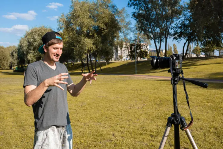 content-creator-talking-to-camera-in-park.jpg